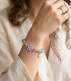 Mystic Knot Charm Bracelet with Aquamarine Beads